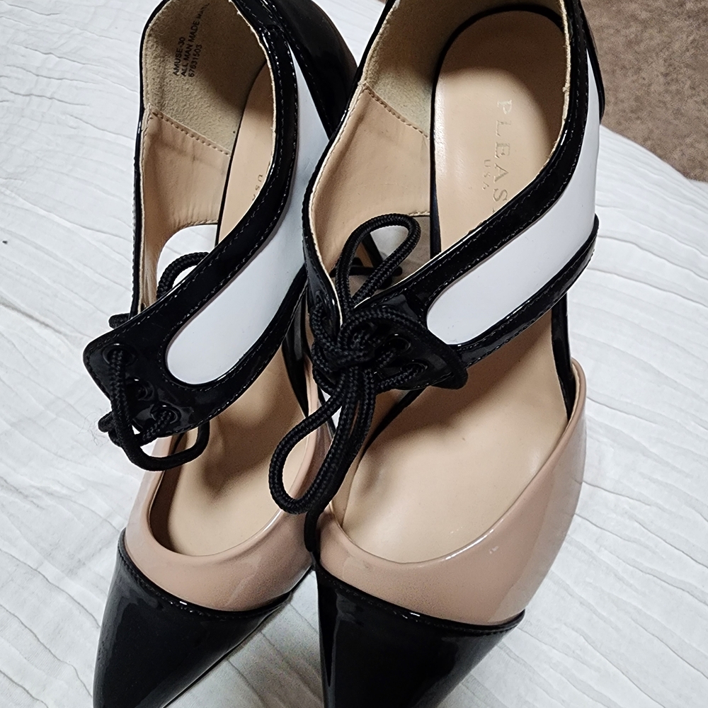 Pleaser Black, White, and Nude Heels